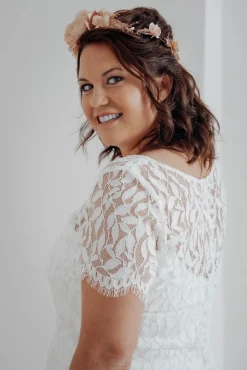 Glamouröser Blumenkranz in Rosatönen><noscript><img width=