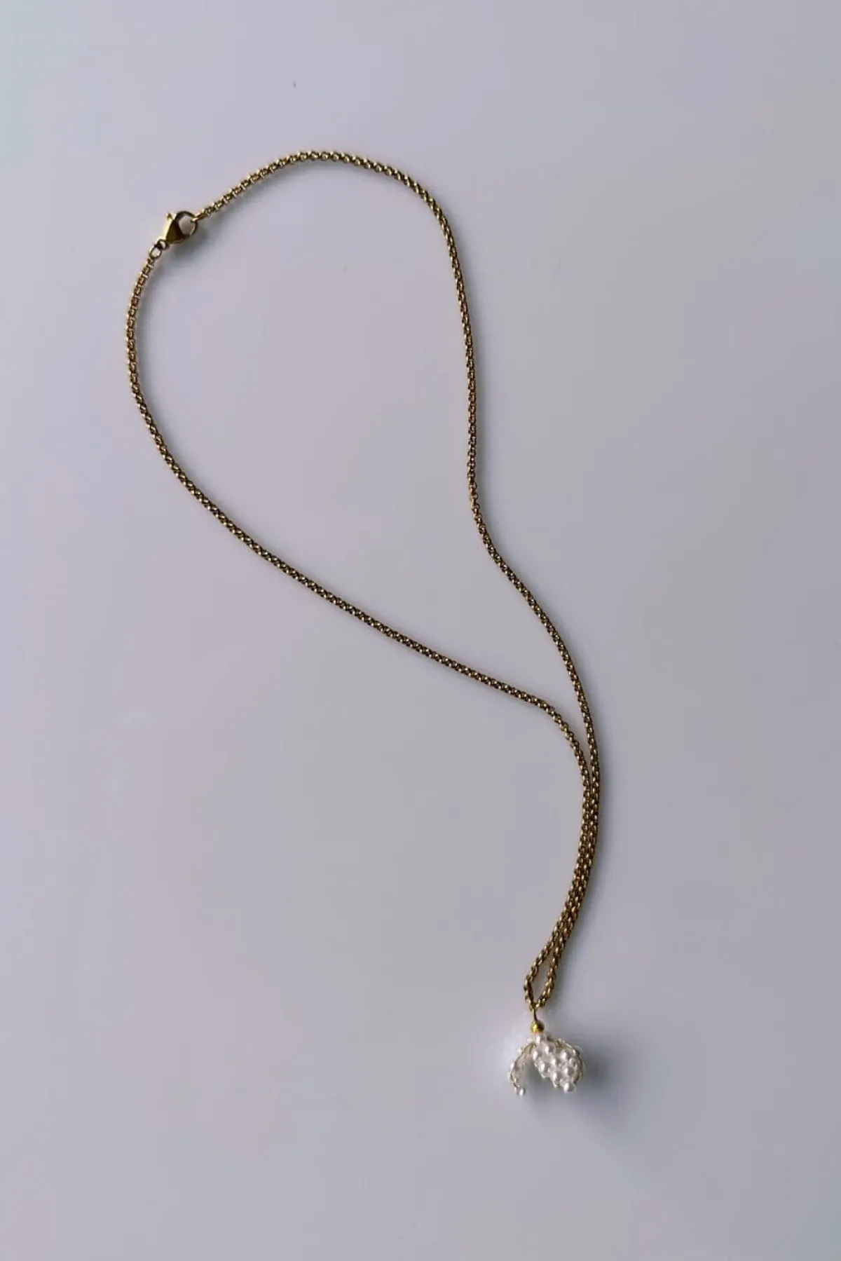 Goldfarbene Halskette mit kleinem Perlenanhänger – Pearl Bell>Decolove Best