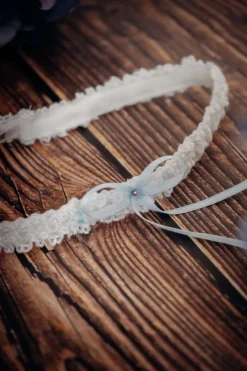 Strumpfband mit blauer Schleife und kleinem Strass-Stein>Poirier Outlet